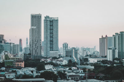 Buildings in city against sky