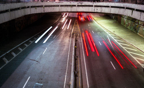 High angle view of light trails on bridge