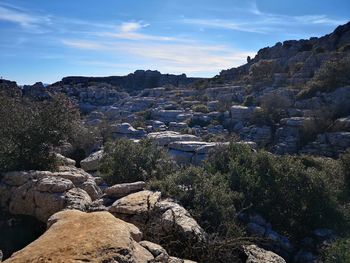 Rocks on mountain against sky