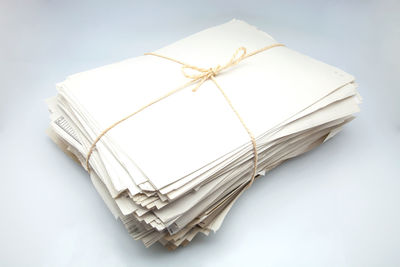 High angle view of ropes tied on white background