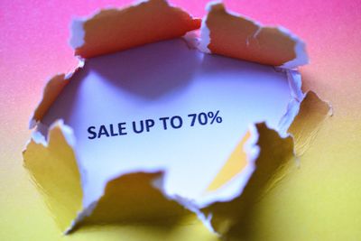 High angle view of heart shapes on yellow wall