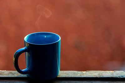 Close-up of coffee cup on table