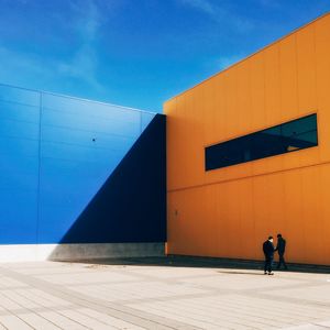 People in front of building