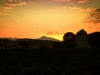 Scenic view of sunset over landscape