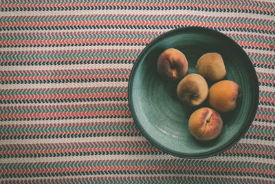 High angle view of fruits in bowl on table