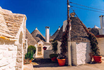 Exterior of old building against blue sky