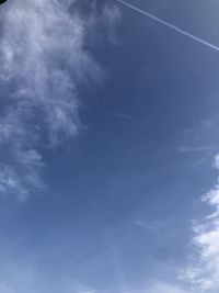 Low angle view of vapor trail in sky