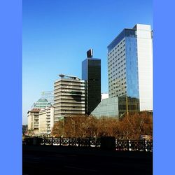 Low angle view of buildings against clear sky