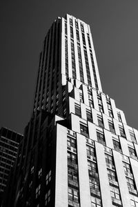 Low angle view of modern building against clear sky