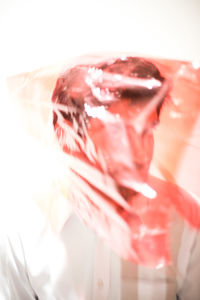 Close-up of ice cream over white background