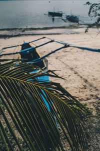 High angle view of fishing net on beach
