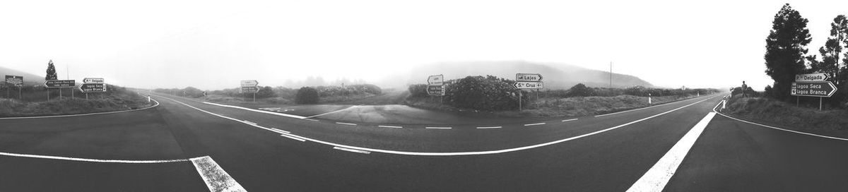 Empty road against clear sky