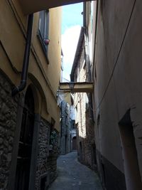 Narrow street amidst buildings in town