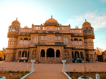 Facade of historic building against sky