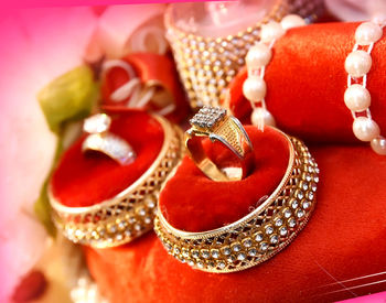 High angle view of red and decorations on metal