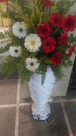 High angle view of white flowering plants in vase