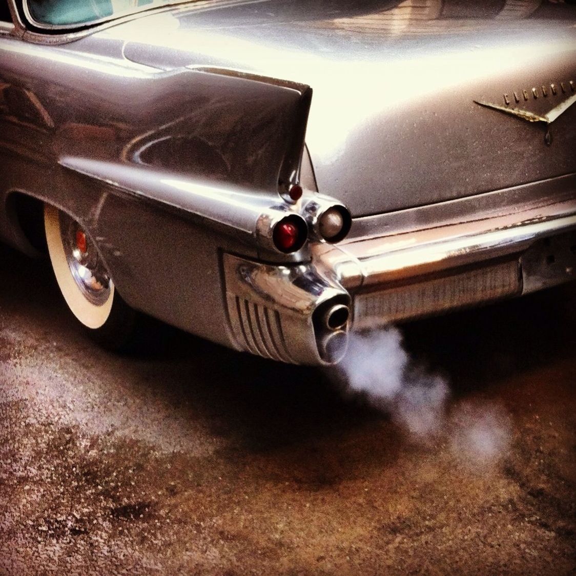 transportation, land vehicle, mode of transport, car, stationary, close-up, wheel, part of, vintage car, travel, no people, headlight, vehicle part, old-fashioned, tire, day, selective focus, street, outdoors, parking