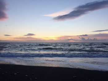 Scenic view of sea against sky at sunset