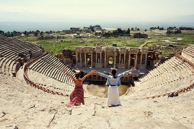Tourists looking at monument