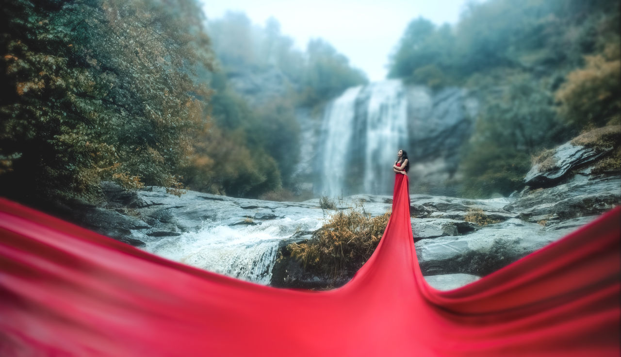 water, motion, scenics - nature, waterfall, day, nature, blurred motion, long exposure, beauty in nature, rock, plant, red, no people, tree, solid, flowing water, forest, outdoors, rock - object, flowing