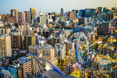 High angle view of modern buildings against sky in city