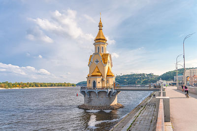 Church of st. nicholas the wonderworker on the water and the pedestrian embankment. kiev, ukraine