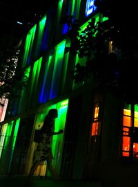 Low angle view of illuminated building at night