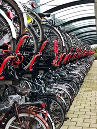 Close-up of bicycles parked in row