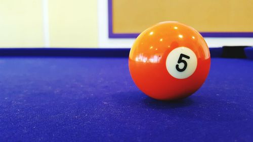 Close-up of ball on pool table