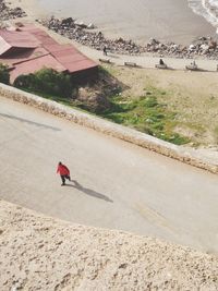 High angle view of man skateboarding on landscape