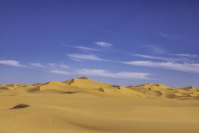Scenic view of desert against sky