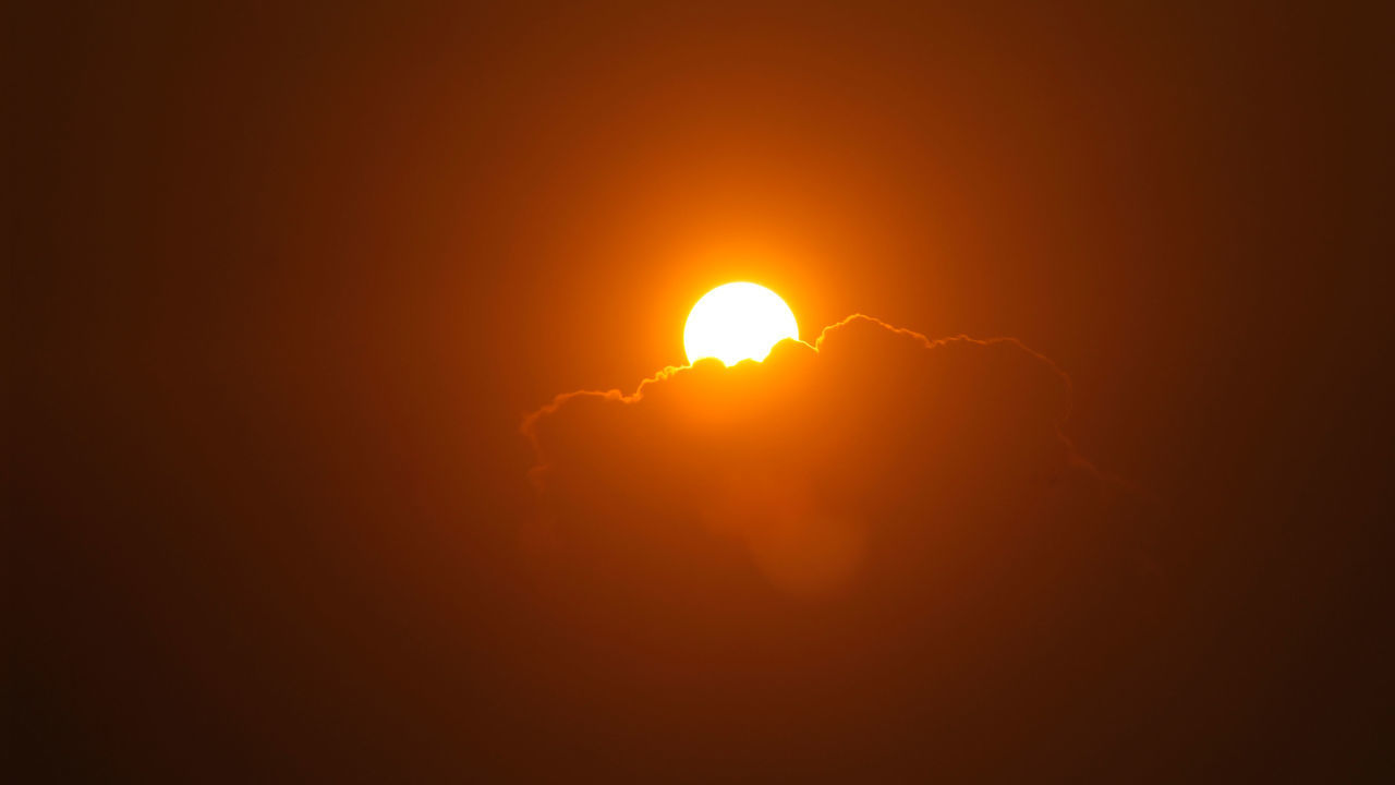 SCENIC VIEW OF SUN DURING SUNSET