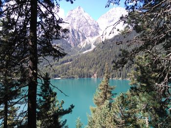 Scenic view of lake with mountains in background