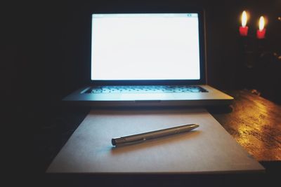 Close-up of laptop on table