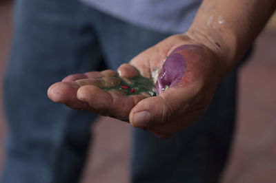 Close-up of man holding liquid