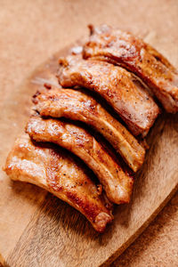 High angle view of meat on cutting board