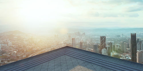 Modern buildings in city against sky