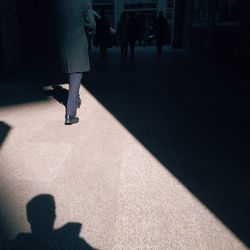 Shadow of woman on wall