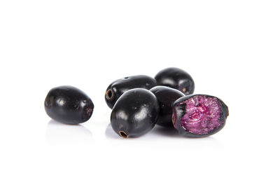 Close-up of fruits against white background