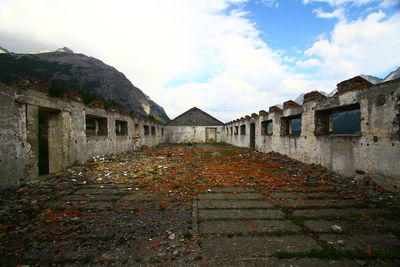 Houses against sky during autumn