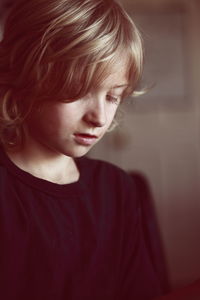 Close-up of boy at home