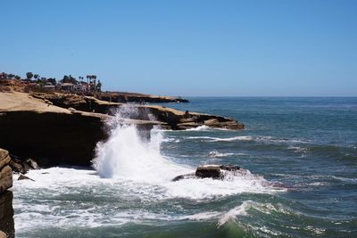 Scenic view of sea against clear sky