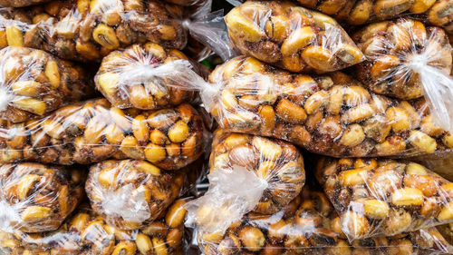 Full frame shot of onions for sale at market stall