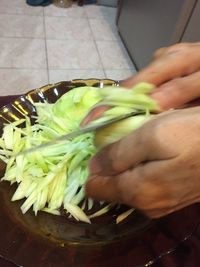 Midsection of man preparing food