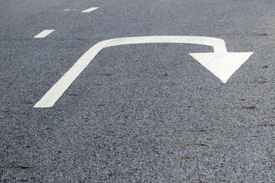 Arrow sign on road