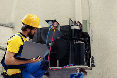 High angle view of man working at home