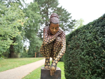 View of statue against plants