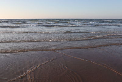 Scenic view of sea against clear sky