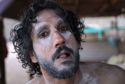 Close-up of young woman looking away