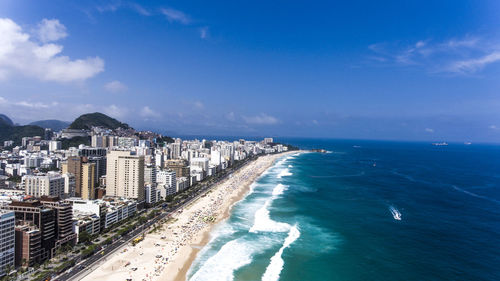 Scenic view of sea against blue sky